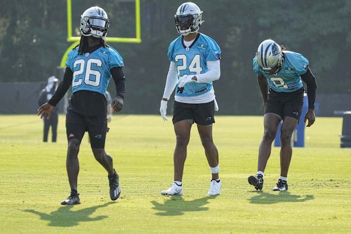 Carolina Panthers cornerback Donte Jackson (26) talks with A.J. Bouye (24) and Jaycee Horn (8) during the Training Camp. Mandatory Credit: Jim Dedmon-USA TODAY Sports